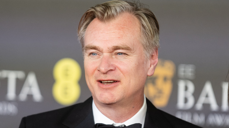 Headshot of Christopher Nolan on the red carpet