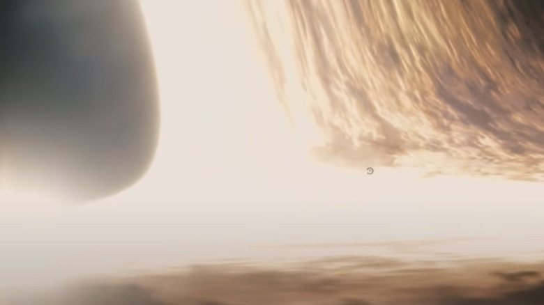 A space shuttle approaches the event horizon of a black hole in Interstellar