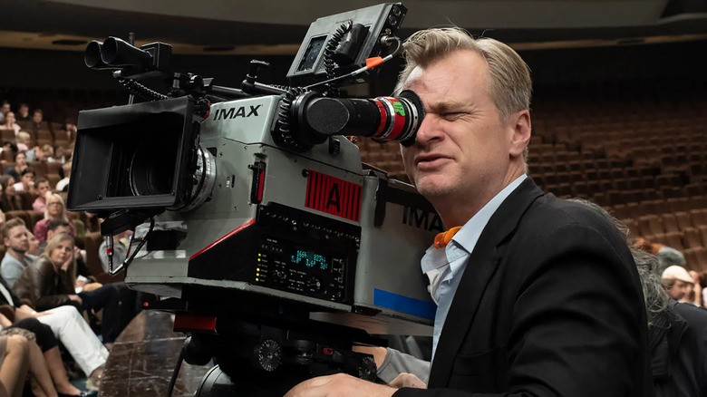 Christopher Nolan shooting with an IMAX camera on the set of Tenet