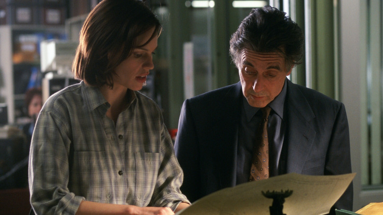Detectives Burr and Dormer looking through files in Insomnia