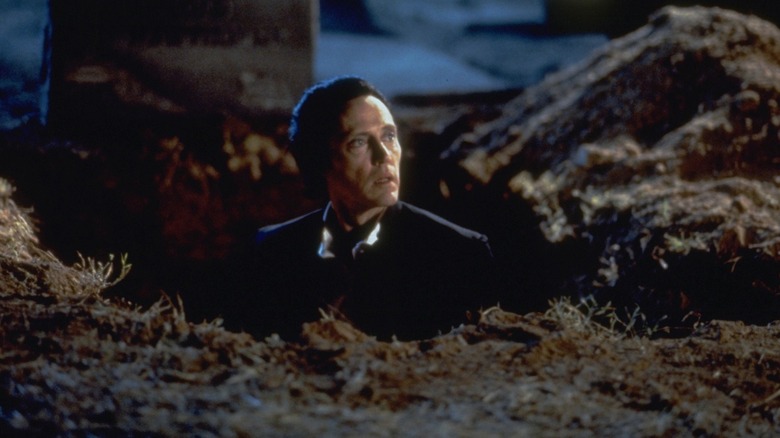 Gabriel in a grave in The Prophecy