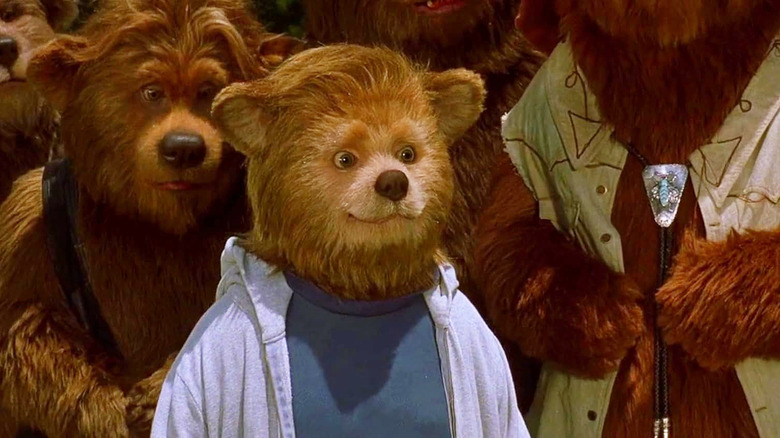 Haley Joel Osment as Beary standing with a group of bears in The Country Bears