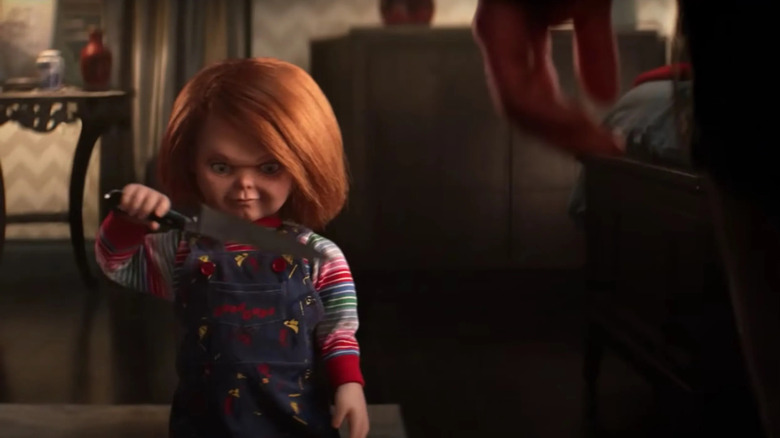 Chucky holding a knife