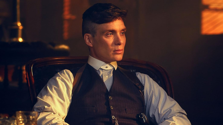 Tommy Shelby (Silian Murphy) sitting on a chair looking for an interest in the peak