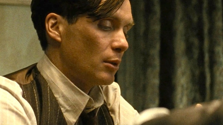 Jozef (Cillian Murphy) sitting down in 