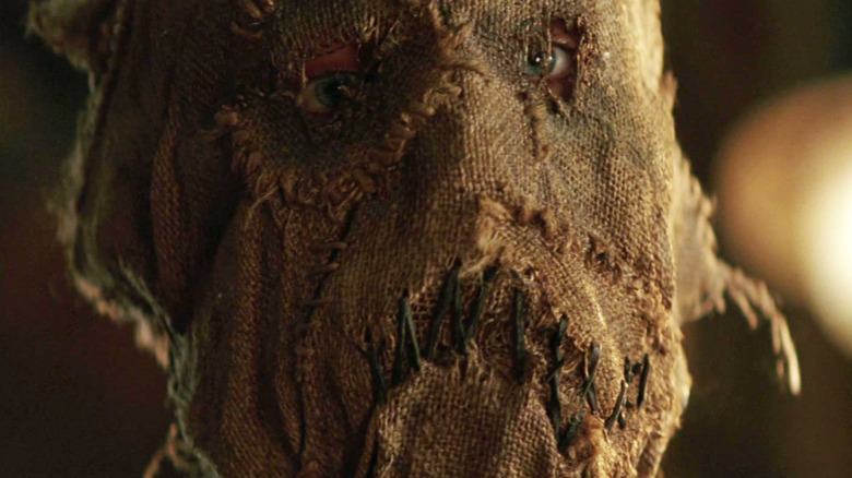 Scarecrow wearing his mask in Batman Begins