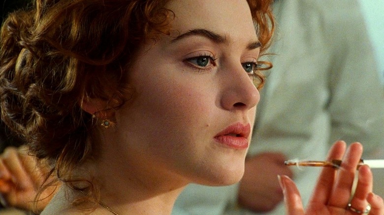 Kate Winslet as Rose smoking a cigarette in Titanic