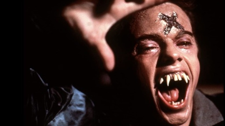 Stephen Geoffreys cross fangs