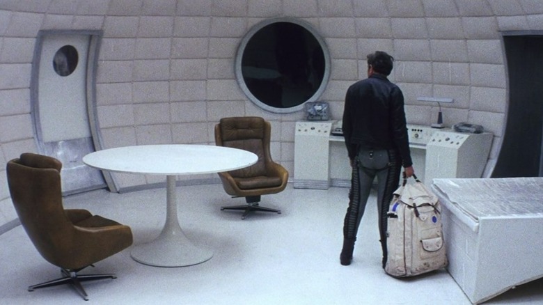 Kris Kelvin in a spacey room in Solaris