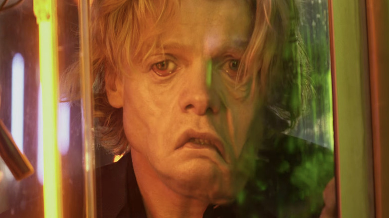 Tom Rhys Harries as Matt Hagen with a melting face in Clayface