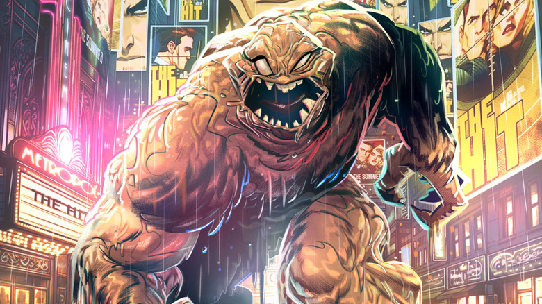 Clayface rampaging down the streets of a city in the rain on the cover of Clayface: Celebrity Dirt