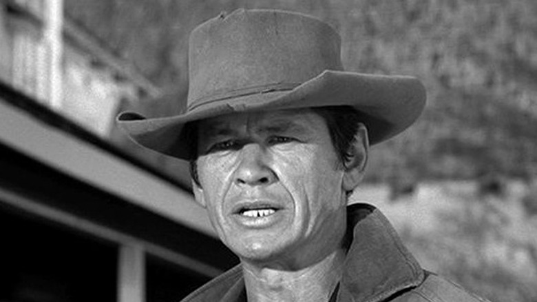 Charles Bronson as Del Lingman standing in the street in the Rawhide episode Duel at Daybreak