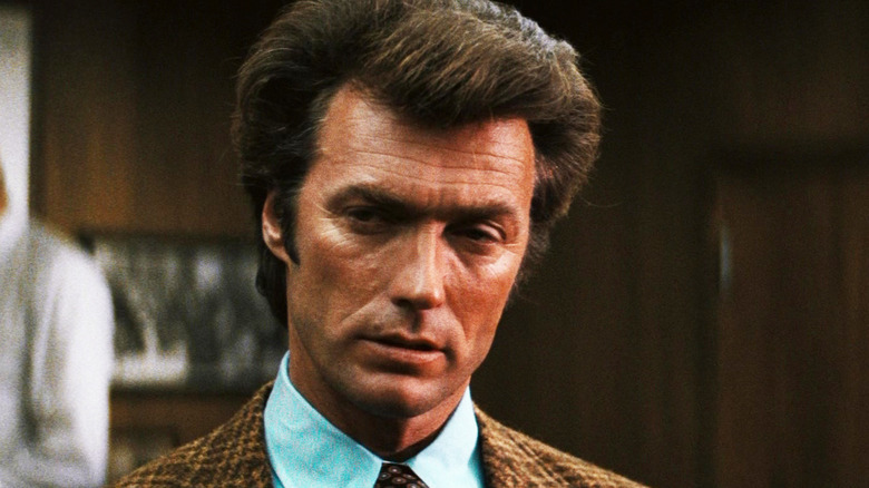 Clint Eastwood's Harry Callahan looks off to his right as he stands in an office in Dirty Harry.jpg