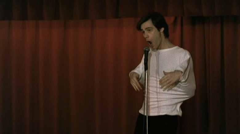 Jim Carrey, which appears on the stage against the red curtain in Pink Cadillac