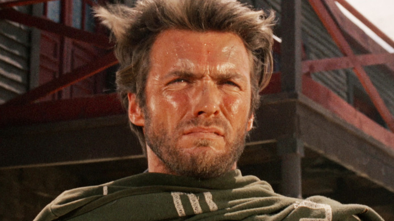 Clint Eastwood's Man with No Name looks off into the distance in Fistful of Dollars