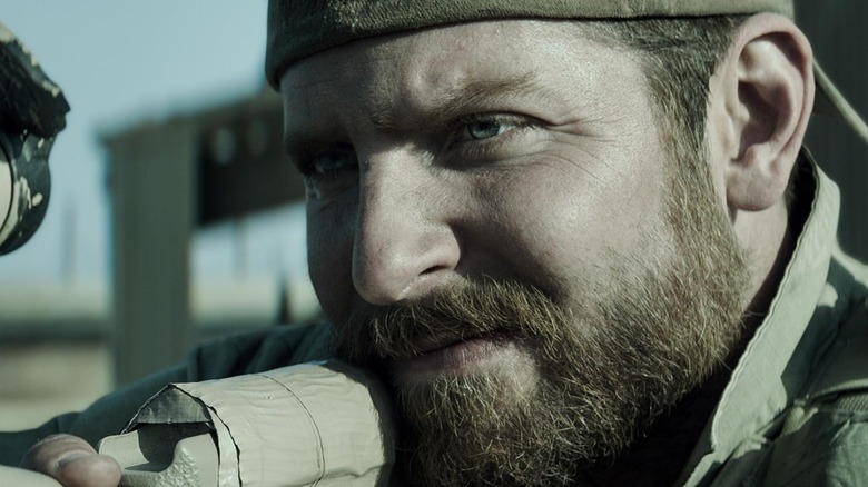 Bradley Cooper lines up a kill shot as Chris Kyle in American Sniper