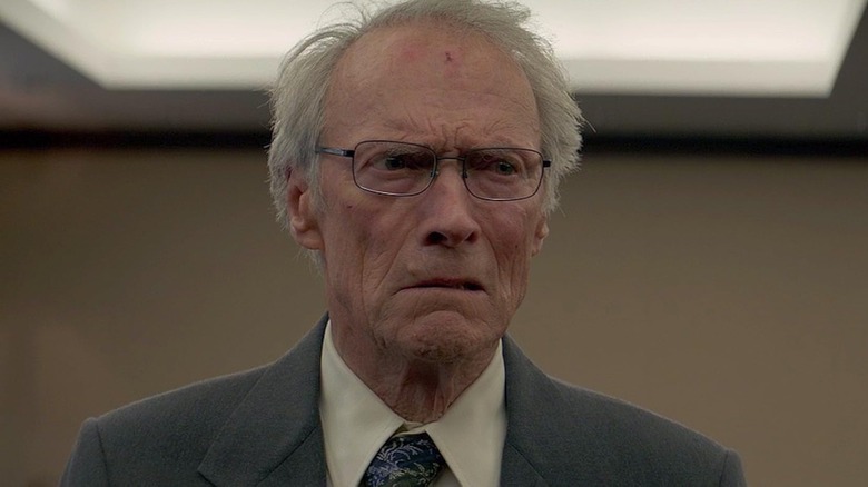 Clint Eastwood as Earl Stone in glasses and suit in the film 