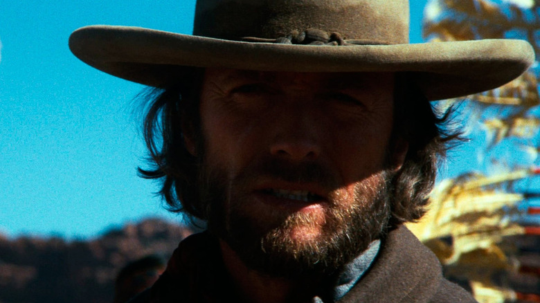 Clint Eastwood as Josey Wales in shadow in The Outlaw Josey Wales