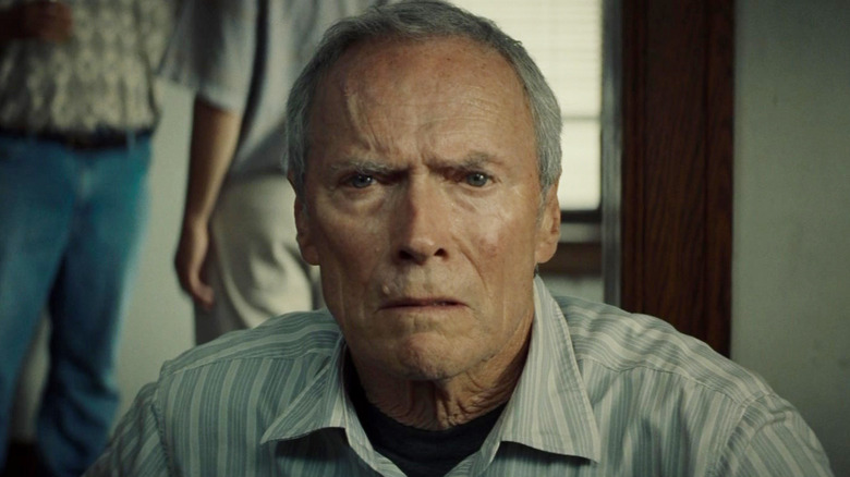 Walt Kowalski listening in concern in Gran Torino