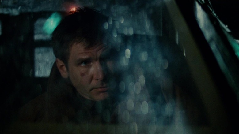 O carro de Harrison's Harrison olha em seu carro em Blade Purner