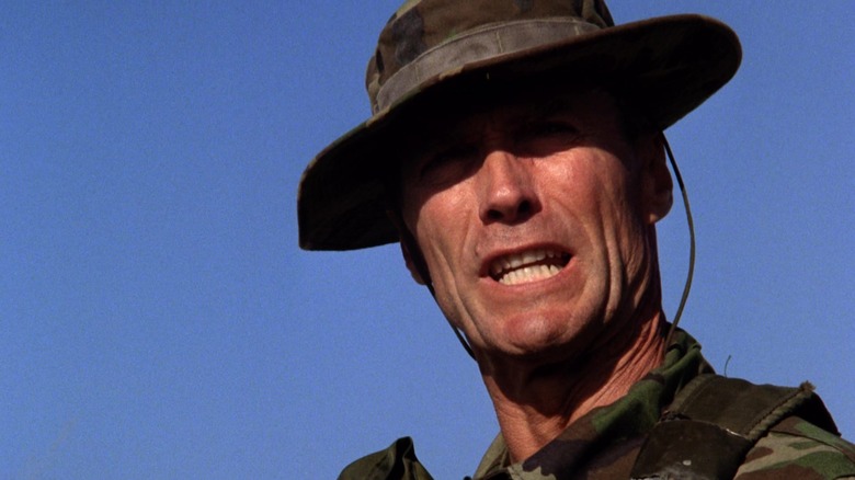 Clint Eastwood's Thomas Highway is seen in closeup against a blue sky in Heartbreak Ridge