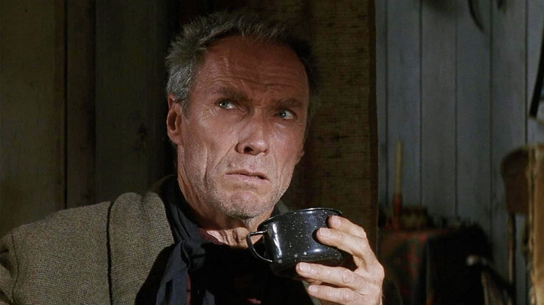 Clint Eastwood with a cup in Unforgiven
