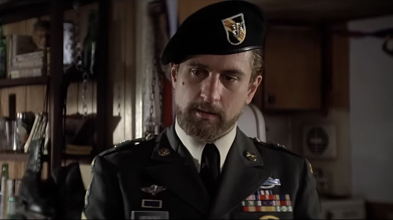 Robert De Niro's Mikhail Vronsky stands in uniform in The Deer Hunter