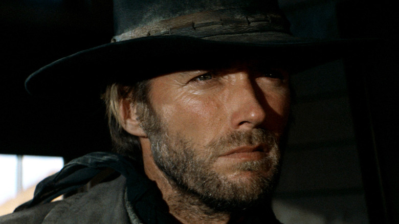 Clint Eastwood's The Stranger draped in shadows in High Plains Drifter