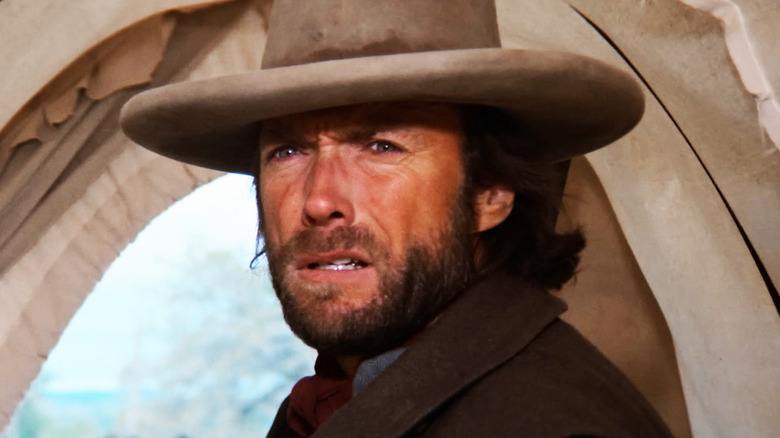 Clint Eastwood's Josey Wales looks worried in closeup in The Outlaw Josey Wales