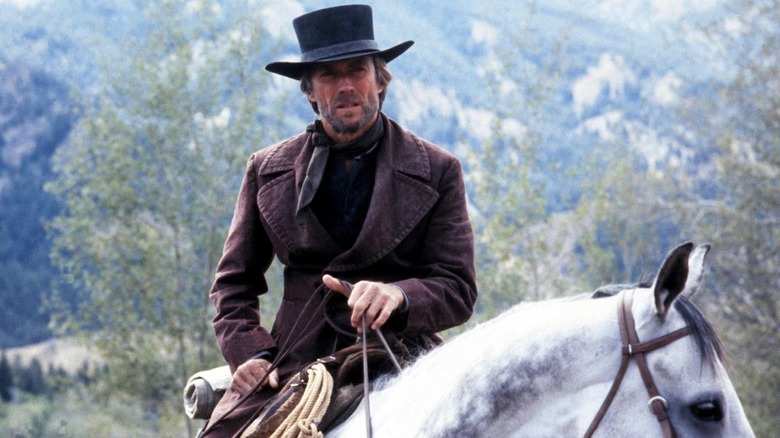 Clint Eastwood on horseback as The Preacher in Pale Rider
