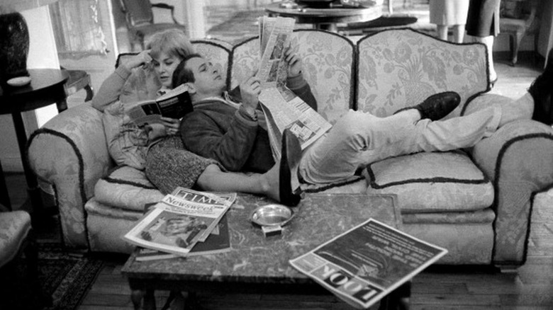 Newman, Woodward lounge reading