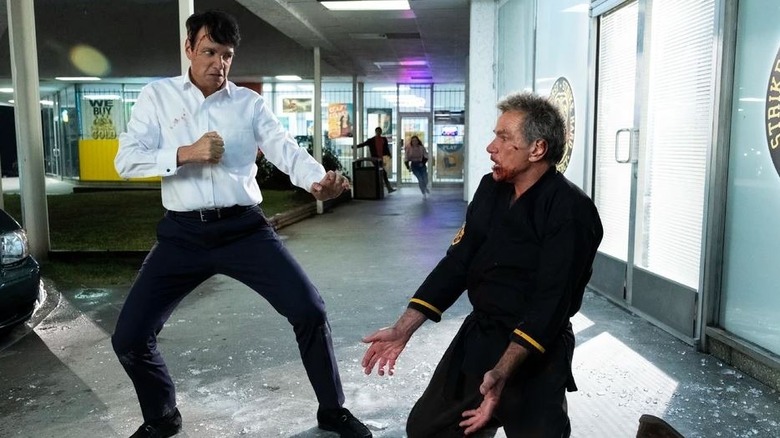 Ralph Macchio's Daniel LaRusso attacking Martin Kove's John Kreese on Cobra Kai
