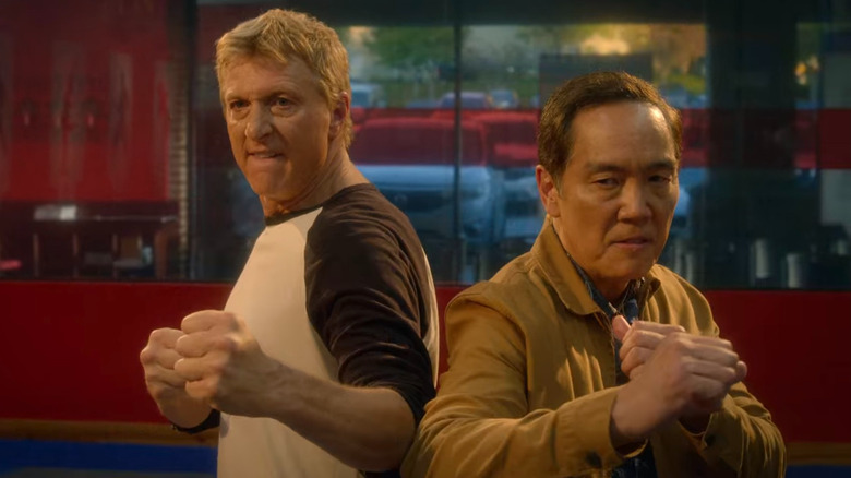 William Zabka and Yuji Okumoto as Johnny Lawrence and Chozen Toguchi in Cobra Kai