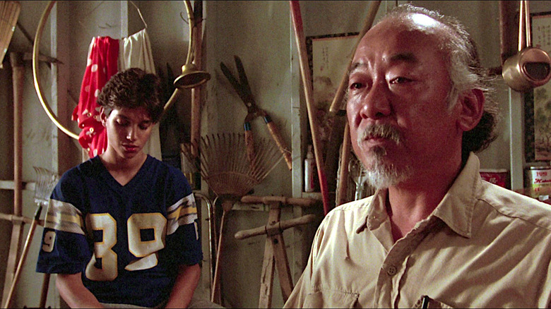 Daniel LaRusso and Mr. Miyagi in his garden shed in The Karate Kid