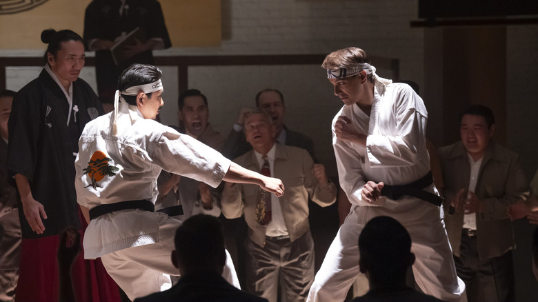 Daniel LaRusso dueling a young Mr. Miyagi in a dream on Cobra Kai