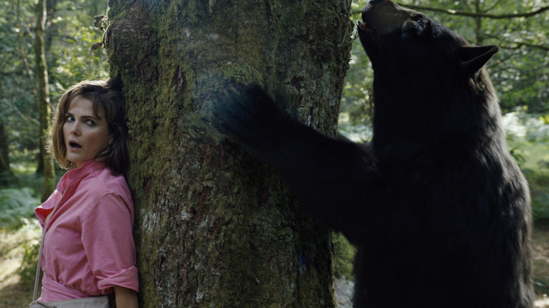 Keri Russell and Cokey in Cocaine Bear