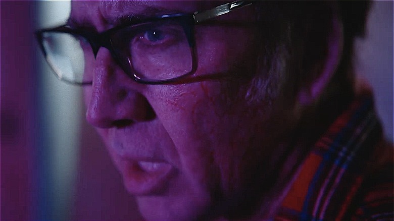 Nicolas Cage as Nathan Gardner in Color Out of Space