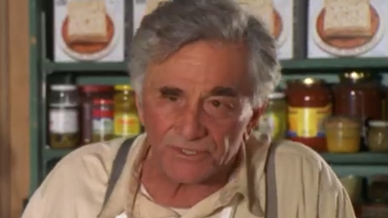 Peter Falk as Abel Shaddick standing in his shop in A Storm In Summer