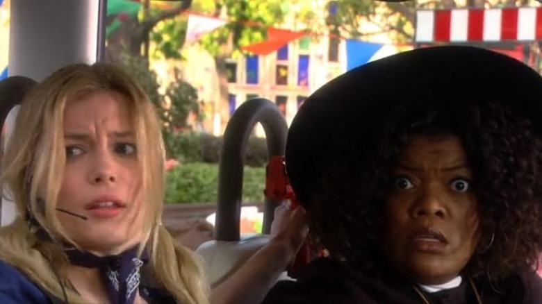 Britta and Shirley looking alarmed while dressed in Western costumes in Community