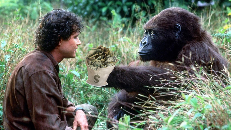 Amy handing Dylan Walsh's Peter a bag full of money in Congo