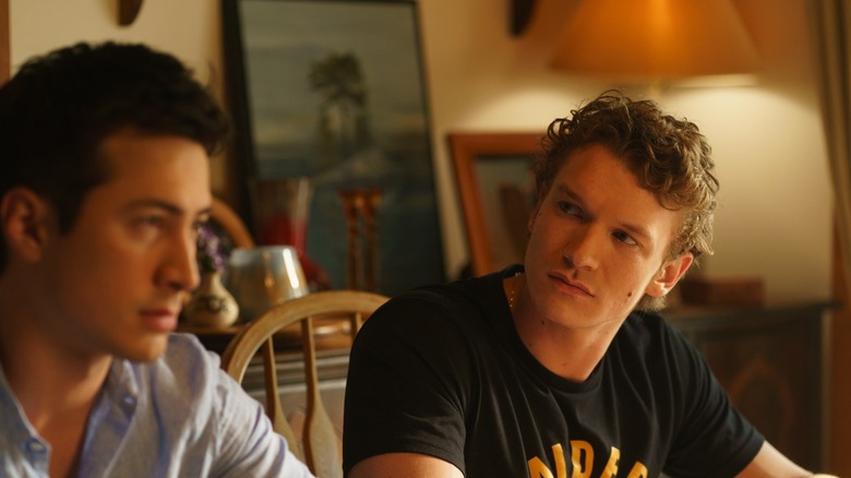 Ilya looking at Shane at dinner on Heated Rivalry