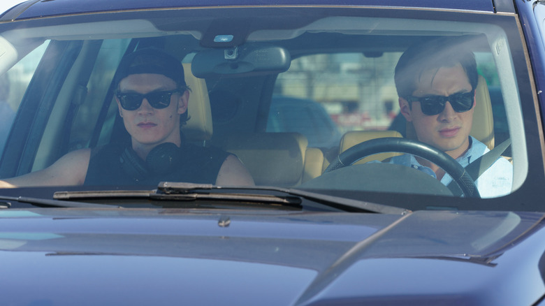 Ilya and Shane in the car going to the cottage on Heated Rivalry