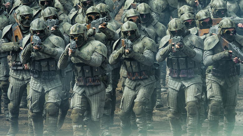 Lines of soldiers with guns drawn in Rebel Moon: Part Two
