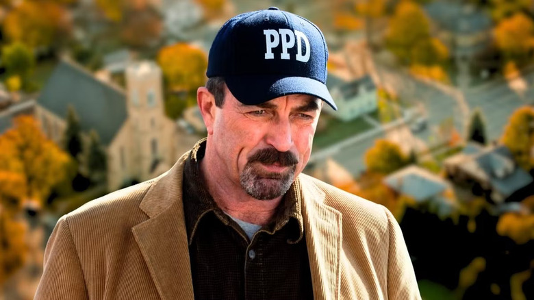 Jesse Stone wearing a hat