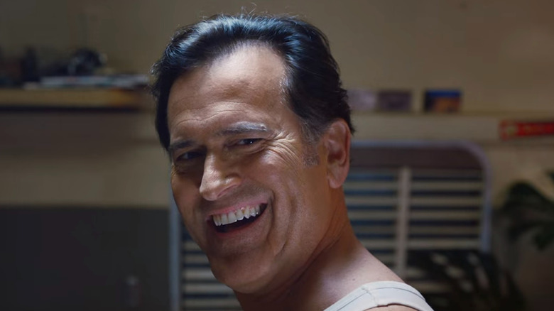 Ash Williams smiling at himself in Ash Vs. Evil Dead