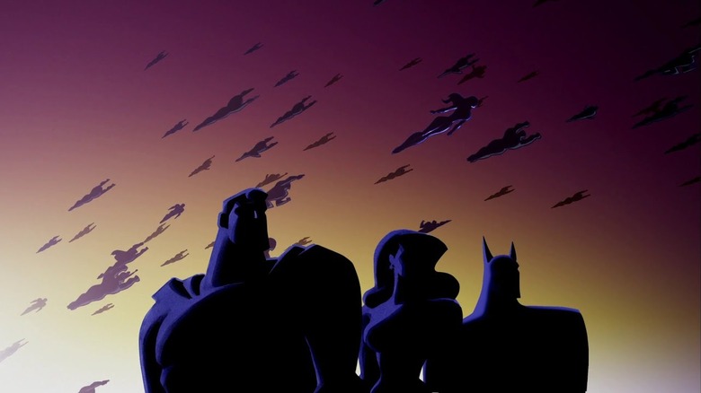Justice League Unlimited title sequence showing silhouetted Superman Wonder Woman and Batman