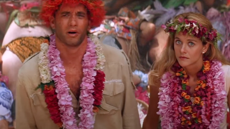 Joe and Patricia covered in flowers Joe Versus the Volcano