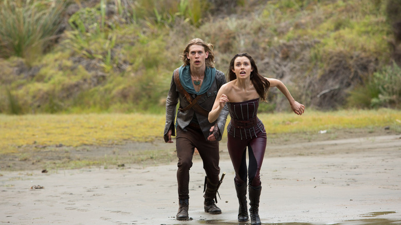 The Shannara Chronicles' Amberle and Will run through a muddy field
