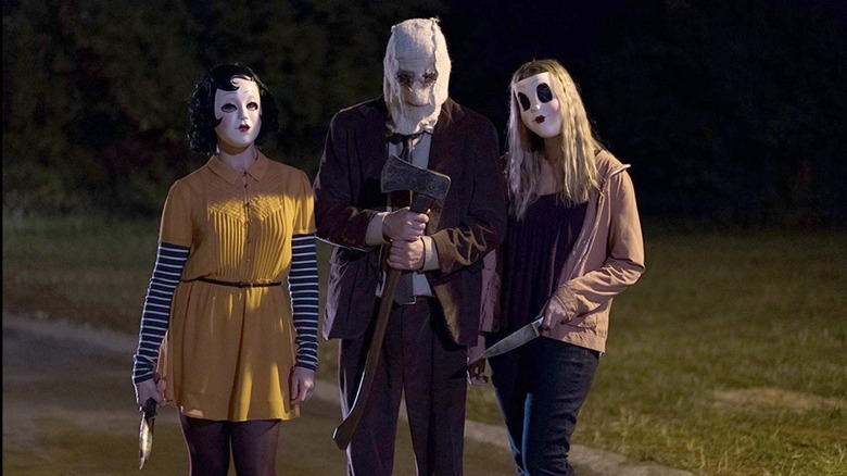 Masked killers with knives axe Strangers: Prey at Night
