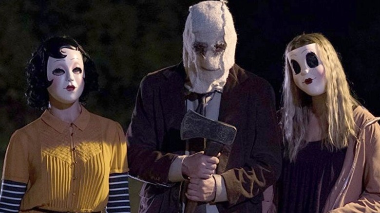 Masked killers with knives axe Strangers: Prey at Night